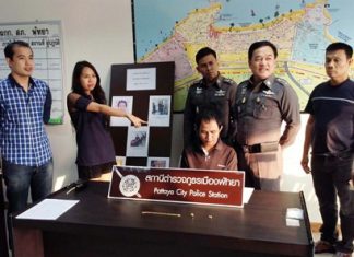 Receptionist Tumaporn Arunritrath makes a positive identification of bellboy Lertlam Kunrat as the person who admitted to stealing her gold.