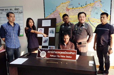 Receptionist Tumaporn Arunritrath makes a positive identification of bellboy Lertlam Kunrat as the person who admitted to stealing her gold.