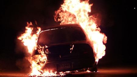 Chief Petty Officer 1st Class Wanlop Wiriyakit narrowly escaped injury when his LPG-powered car burst into flames in Sattahip.