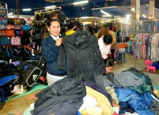 Vendors at the Grand Hall Market near Friendship Supermarket have brought out coats and warm clothes to sell.