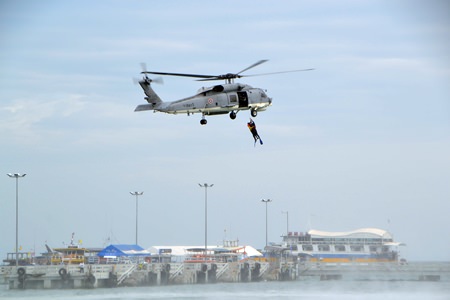 A helicopter from Naval Base 1 demonstrates how to rescue people at sea.