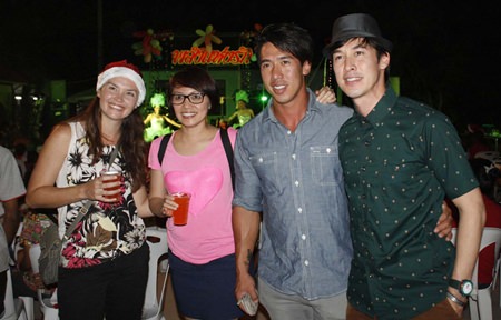 Actor Ad Asada and windsurfers Siriporn Kaewduang-ngam, Srocha Pumprai and Krongkaew Sukulfang joined several dozen HIV patients and even villagers and children from the community that is evicting them at the Glory Hut Foundation’s Dec. 25 party in the Lang Nern neighborhood.