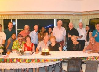Apple guru Steve Greenstein (standing, right) enlightens a group of PCEC members about how to get the most out of their iPhone.