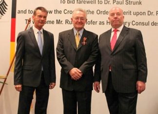 Austrian consul adds German honorary post German Ambassador H.E. Rolf Schulze (right) with his new designated honorary consul Rudolf Hofer (left) at the farewell party of Dr. Paul Strunk (centre).