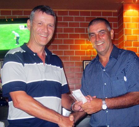 50-50 winner Richard Kubicki (left) with Golf Chairman Mark West.