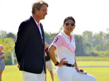 HRH Princess Sirivannavari Nariratana (right) talks with Harold Link, chairman of the B. Grimm Group, while watching the equestrian event.