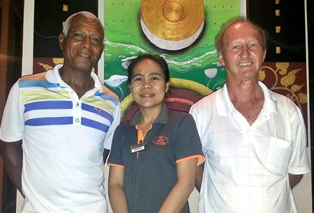 Landis Brooks (left) and Daryl Evans (right) with one of BJ’s Holiday Lodge staff.