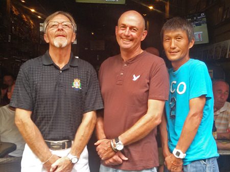 Bill Eyles, Phil Smedley and Ken Aihara protect their assets on the podium.