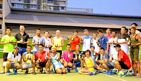 Category winners pose with their trophies at the conclusion of the Bangkok Pride International Gay Lawn Tennis tournament on December 7 at Chulalongkorn University in Bangkok.