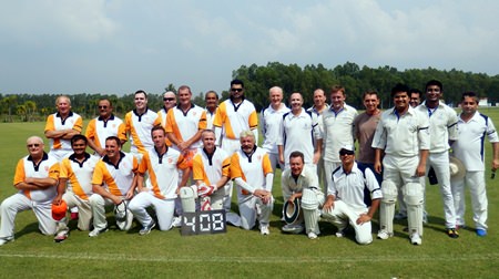 Pattaya Cricket Club and British Club of Bangkok line up for a team photo at the Thai Polo Ground in Pattaya, Sunday, November 30.