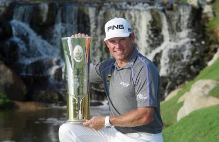 Lee Westwood hold’s the trophy after winning the 2014 Thailand Golf Championship at Amata Spring Country Club in Chonburi, Sunday, Dec. 14.
