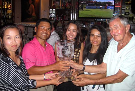 Jim Preddy presents the Memorial Trophy to the winning team - Duang’s Girls.