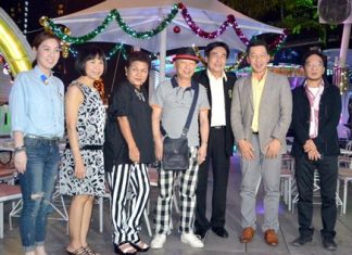 Ronakit Ekasingh (3rd right), the deputy mayor of Pattaya, joins Alcazar board member Suthat Phetctrakul and honoured guests during the grand opening of the Triangle Bar and Karaoke venue on Dec. 23.