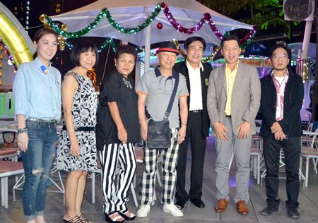 Ronakit Ekasingh (3rd right), the deputy mayor of Pattaya, joins Alcazar board member Suthat Phetctrakul and honoured guests during the grand opening of the Triangle Bar and Karaoke venue on Dec. 23.