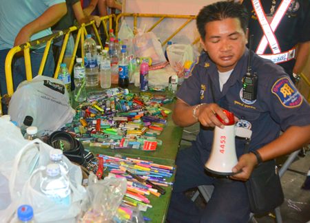 Police collected many pens, lighters and bottles, preventing people from using them in the stage area to harm others.
