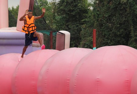 There was one boy who ran the red balls, but he worked at the park.