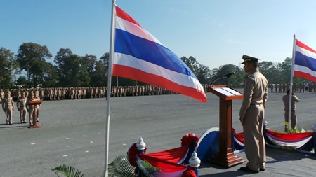 Capt. Saman Khantapong, commander of the Naval Recruit Training Center, addresses the 3,846 newly commissioned Royal Thai Navy sailors before dismissing them to join their respective divisions at 28 active navy units.