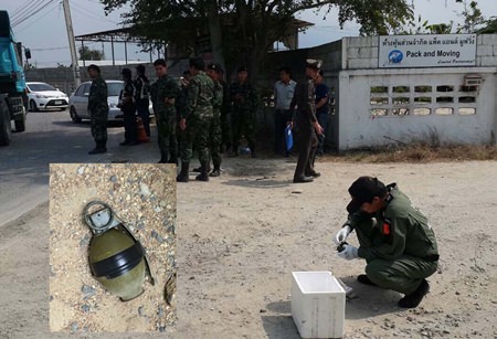 Banglamung authorities inspect a grenade (inset) found the Pack & Moving Co. in Laem Chabang.
