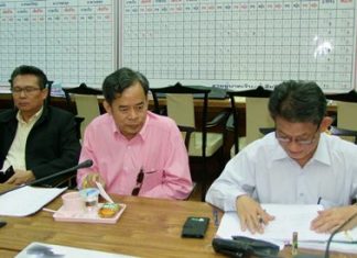 Officials man the tally board (background) of this year’s road carnage in Chonburi during the “seven dangerous days” of Dec. 30-Jan. 5.