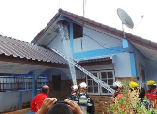 Fire damages vacant house in Sattahip Firefighters extinguish a small fire that damaged an empty home in Sattahip.