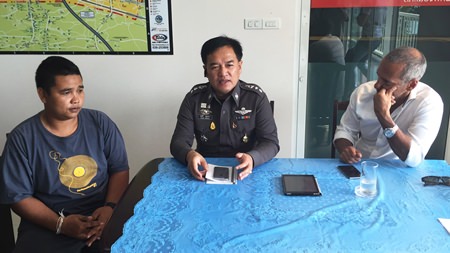 Pol. Col. Supathee Bunkhrong (centre) interrogates jet ski vendor Chawalit Janthong who was arrested for assaulting a Swedish tourist who intervened in the vendor’s alleged extortion of a customer.