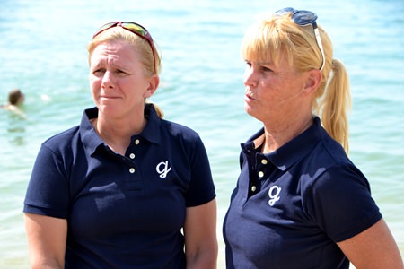 Nancy Martin (right) and Michelle Davidson (left) point out safety issues for the swim from Pattaya Beach to Koh Larn Island.