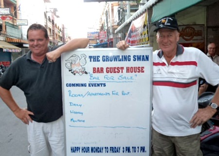Monday winner Mark Henkel (left) with Compass Cap recipient Alan “Colonel” Sanders.