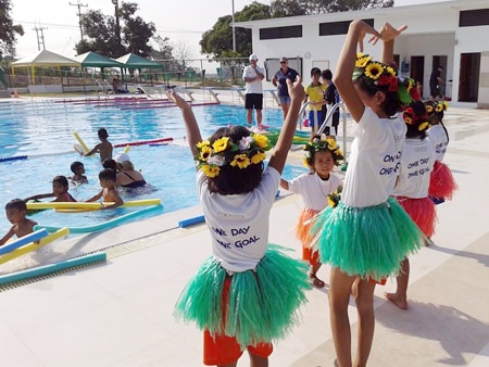 Children from Shelter Center Pattaya gave an impromptu Hawaiian dance show at the St. Andrews school swimming pool.
