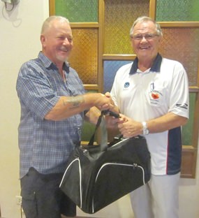 Barry Elphick (left) receives the MBMG Group Golfer of The Month award for December.