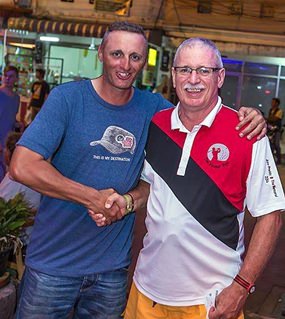 A Flight winner Peter Hynard (right) is congratulated by Christian Boysen.