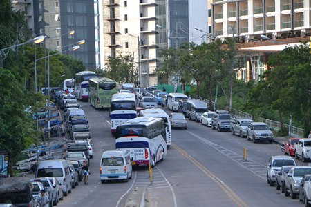 Traffic gets congested at the entrance to Bali Hai Pier, as people are allowed to park cars on both sides of the street and on the left lane of the ramp.