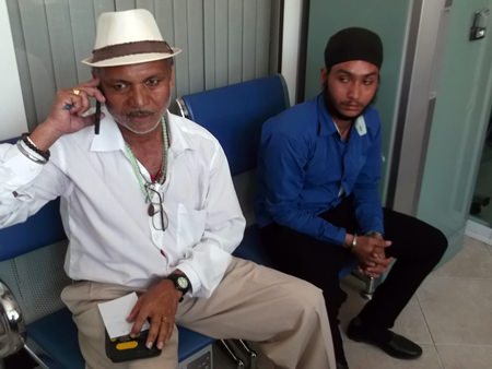 Hukam (left) and Gurpreet Singh (right) were arrested for working without a permit for allegedly charging tourists to read their fortunes.