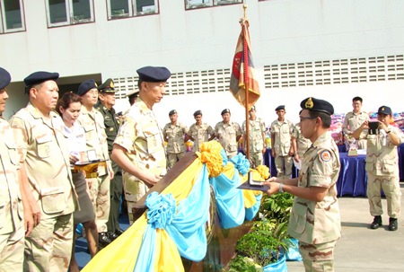 The anniversary commemoration included presentation of the defense volunteers broach.
