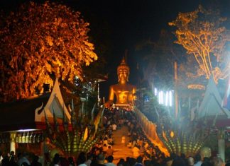 Pattaya Buddhists, shown here on “Buddha Hill” (Wat Khao Phra Yai) during last year’s event, will merit and parade with candles as the area celebrates Makha Bucha Day, one of the holiest days on the Buddhist calendar.