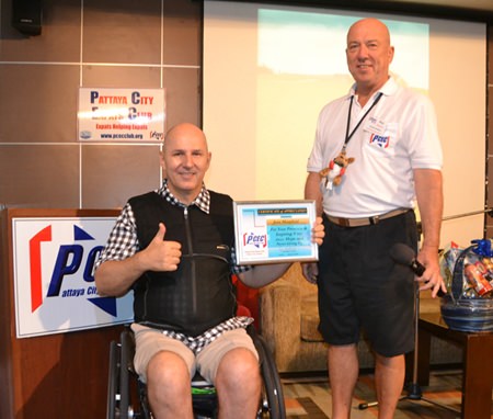 PCEC Chairman Roy Albiston presents Jens Maspfuhl with the Club’s Certificate of Appreciation for his inspiring story about becoming a paraplegic and how he went on to have an active and meaningful life.