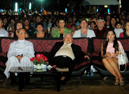 (From left) Fr. Michael Weera, guest of honor Dr. Chatchai Saengsuriyachat, and his wife enjoying the show. 