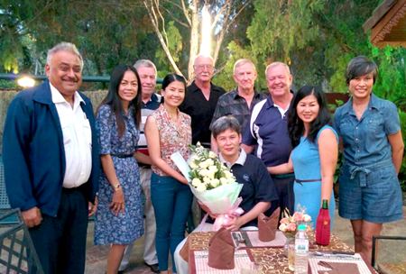 Mai (seated centre) poses for a photo with Peter Malhotra (PSC President), Joe Mooneyham (PSC Vice President), George Bennison (Club Secretary), Geoff Crouch (Registrar), Jim Bryan (Treasurer), Noi Emmerson (Charity Chairperson) and PSC office colleagues Somkhit Charoenphon (Khit) , Nantida Thepsai (Lucky) and Shonasan Lomachaem (Nam) at the Courtyard Restaurant.