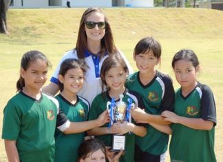 Garden girls triumph in football contest GIS’s under-9 girls football team with coach Ms Natalie.