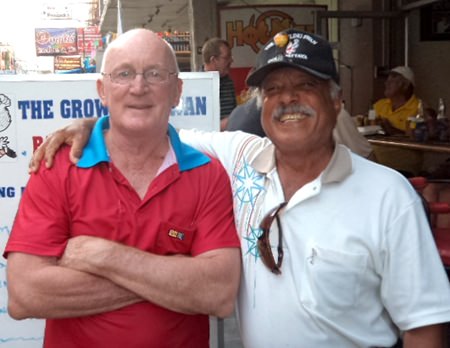 Mark Stapleton (left) with Ebrahim donning the Coveted Compass Cap.