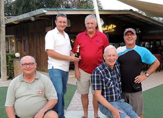 John Player (centre) is presented the trophy by Greg Hirst of DeVere with Andy Makara (seated left), John Stafford (seated right) and Kim Danboise.