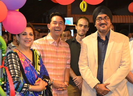 Mayor Itthipol Khunplome enjoys a happy moment with Nithi and Naini Grover.