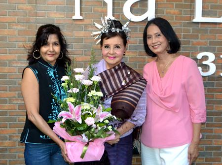 Sue Kukarja (left) representing the Pattaya Mail Media Group, congratulates Sopin Thappajug, Managing Director of Diana Group (centre) during the grand opening of the Na Lanna Condominium in North Pattaya, March 4.