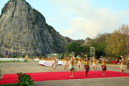 Young Thai dancers perform in front of the Khao Chi Chan Engraved Buddha Image during the annual Makha Bucha Day carving ceremony to preserve the image.  People throughout the Kingdom flocked to local temples to commemorate the occasion when 1,250 disciples traveled to meet with Lord Buddha with no prearranged agreement at Weluwan Mahawiharn Temple in the area of Rachakhryha, India.  