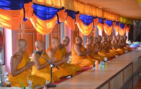 Phra Kru Wijarn Thammakit, aka Luang Pu Maha Sombat (far left) and monks at Khao Makok temple perform a prayer service on Makha Bucha Day.