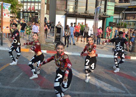 Dancers from school number 11 entertain the crowds at Central.