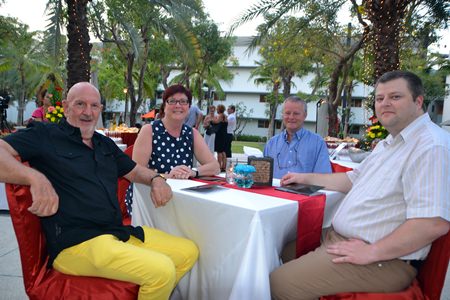 (L to R) Noel Wittoeck, Marina Slabaer, Danny D’Hooghe, and Ward D’Hooghe sample the wines on offer during the monthly ‘Wine Experience’ in the garden between the Amari’s Garden Wing and the new Tower.