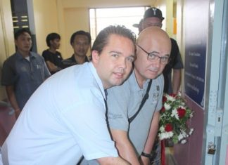 Redemptorist school opens facility for severely disabled Per Egebjerg and Christian Enevoldsen jointly cut the ribbon to open the new facility.