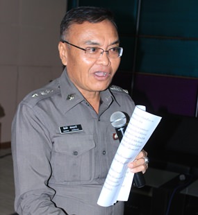 Pol. Lt. Col. Peerapus Sornbootdee, deputy superintendent of the crime suppression division at Nongprue Police Station, conducts the training of Nongprue residents who want to become civil-defense volunteers.