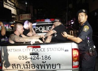 Three bar customers are taken to the police station for further questioning after a bar brawl in Soi LK Metro.