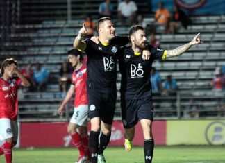 Pattaya United’s Nikola Komazec (left) and Milan Bubalo (right) of Serbia celebrate the latter’s goal during first half stoppage time of their Thai Division 1 fixture against Samut Songkhram FC at the Nongprue Stadium in Pattaya, Sunday, March 8.